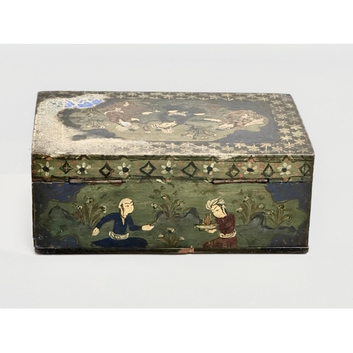 214 - An early 20th century Indian hand painted wooden tabletop storage box. 17.5x10.5x6.5cm