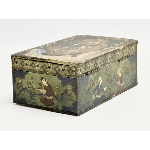 214 - An early 20th century Indian hand painted wooden tabletop storage box. 17.5x10.5x6.5cm