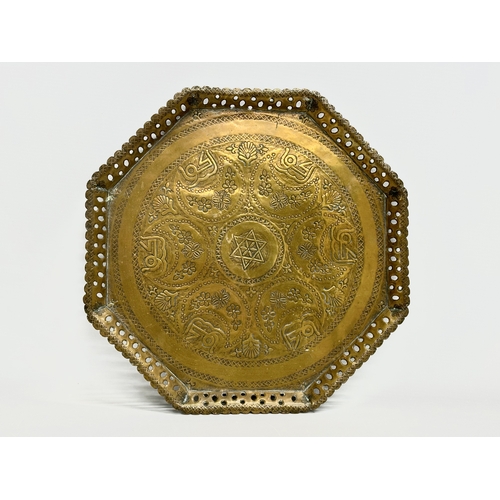 215 - 2 late 19th century Middle Eastern brass trays. 32x33cm