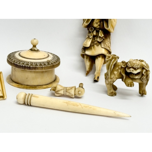 221 - A collection of 19th century Chinese carved bone.