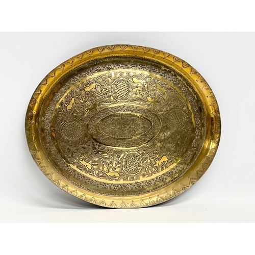 237 - 19th century Middle Eastern brass bowls and tray. Tray measures 29.5x24.5cm. Bowls 12cm, 11.5cm, 10c... 