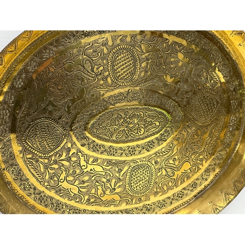 237 - 19th century Middle Eastern brass bowls and tray. Tray measures 29.5x24.5cm. Bowls 12cm, 11.5cm, 10c... 