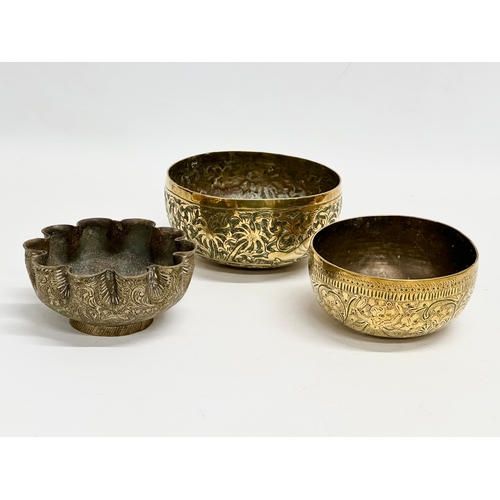 237 - 19th century Middle Eastern brass bowls and tray. Tray measures 29.5x24.5cm. Bowls 12cm, 11.5cm, 10c... 