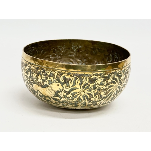 237 - 19th century Middle Eastern brass bowls and tray. Tray measures 29.5x24.5cm. Bowls 12cm, 11.5cm, 10c... 