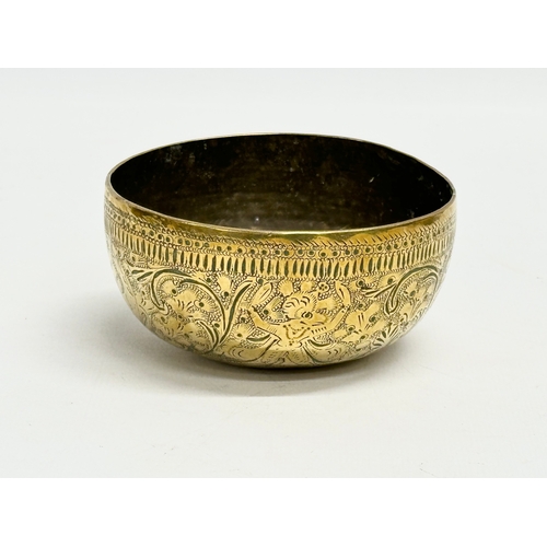 237 - 19th century Middle Eastern brass bowls and tray. Tray measures 29.5x24.5cm. Bowls 12cm, 11.5cm, 10c... 