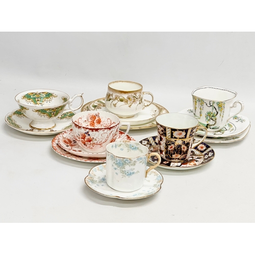 240 - A collection of cups and saucers. A Birks Rawlings & Co Imari cup and saucer. A Doulton Burslem ‘Kat... 