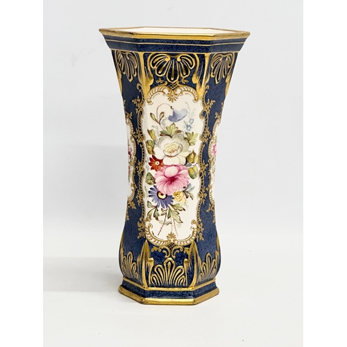 244 - A hand painted porcelain vase. 13x12x24cm