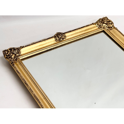 170 - A good quality vintage ornate gilt framed mirror. 46x86cm