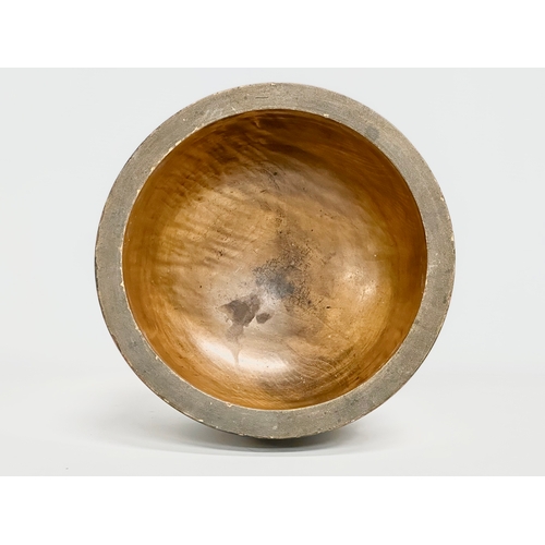 252 - An early 20th century pokerwork centrepiece bowl. 25x20cm