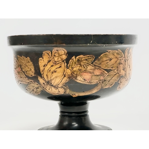 252 - An early 20th century pokerwork centrepiece bowl. 25x20cm