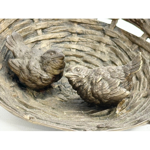 255 - A signed good quality bronze birds in the nest ornament. 20x21x13cm