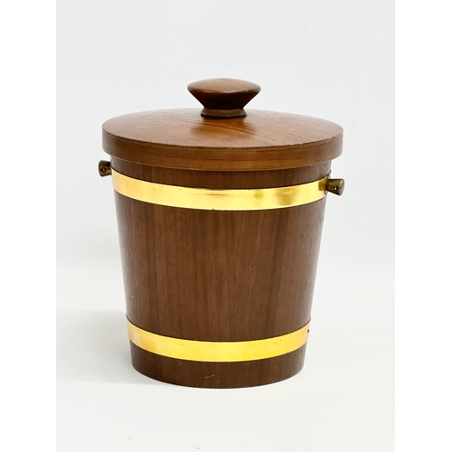 145B - A 1970’s Mid Century teak ice bucket. 23x24cm