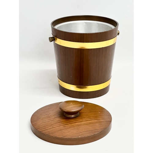 145B - A 1970’s Mid Century teak ice bucket. 23x24cm