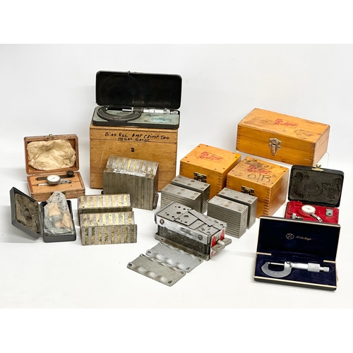 258 - A collection of vintage precision tools. Eclipse magnetic chuck blocks, micrometers etc.