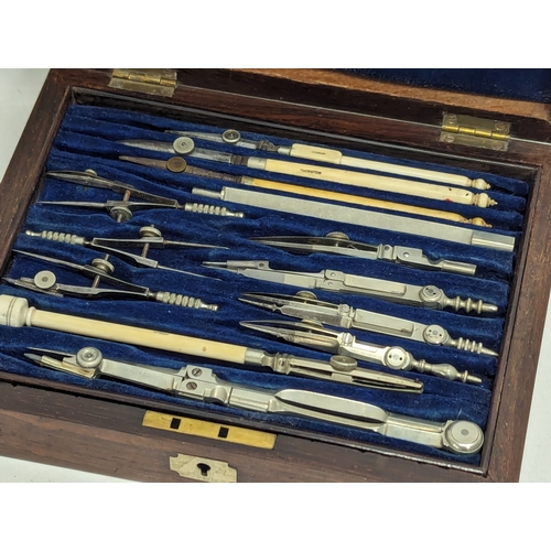 A vintage draftsman set in case marked Stanley and Thornton.