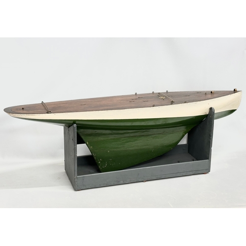 55A - A large good quality vintage model yacht on stand. Yacht measures 135x29x41.5cm