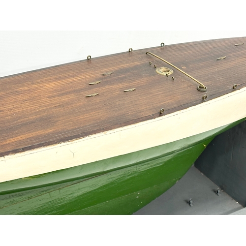 55A - A large good quality vintage model yacht on stand. Yacht measures 135x29x41.5cm