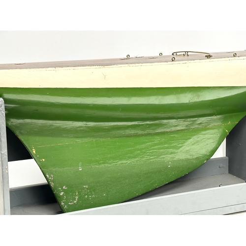 55A - A large good quality vintage model yacht on stand. Yacht measures 135x29x41.5cm