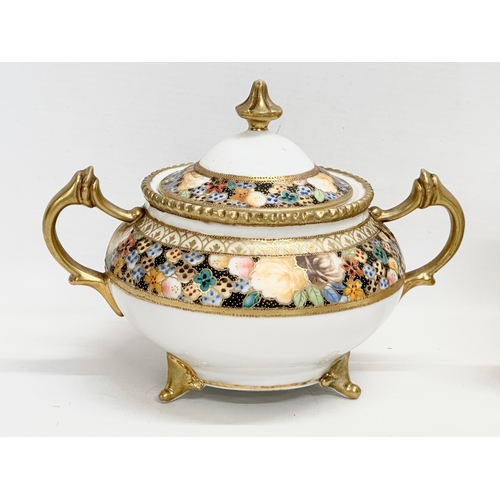 366N - An early 20th century Japanese hand painted porcelain part tea service by Noritake.