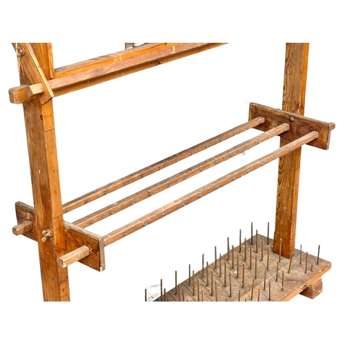 171 - An early 20th century industrial weaving sewing  stand. 125.5x34.5x127cm