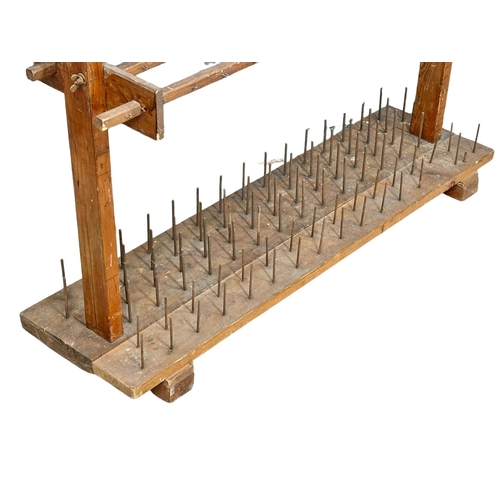 171 - An early 20th century industrial weaving sewing  stand. 125.5x34.5x127cm