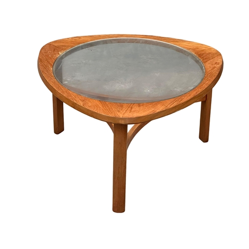 A Mid Century teak Astro coffee table by Nathan Furniture. 77x77x44cm