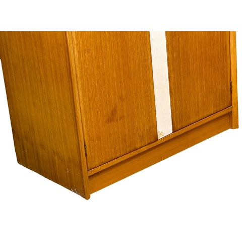 925 - A Mid Century gents wardrobe. 91x51x170cm