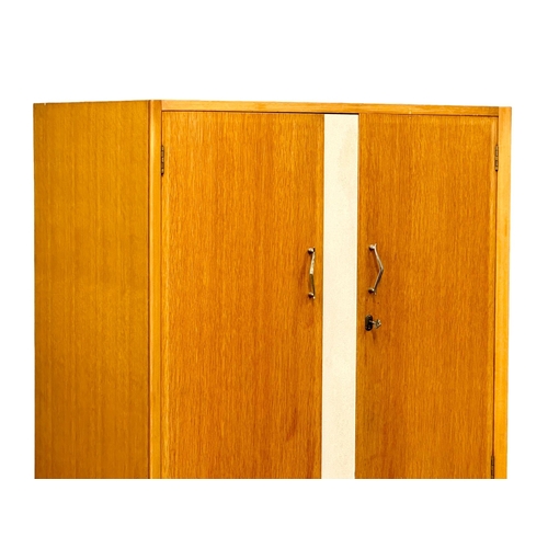 925 - A Mid Century gents wardrobe. 91x51x170cm