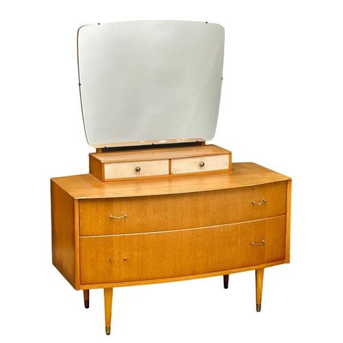 926 - A Mid Century dressing chest. 107x52x138cm