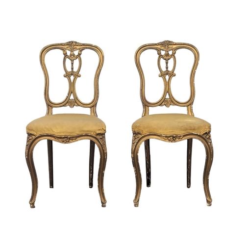 929 - A pair of early 20th century side chairs.