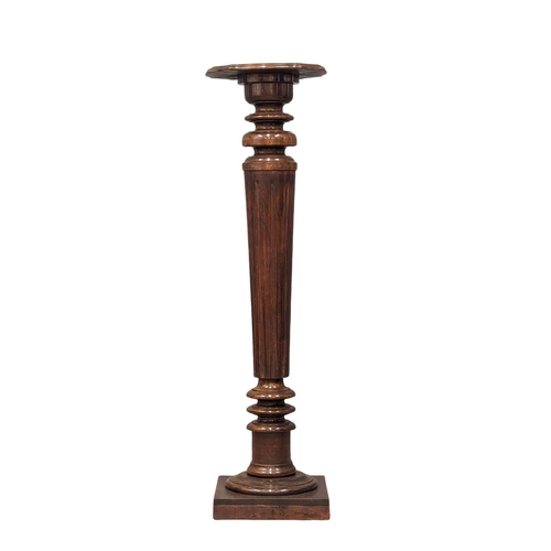 933 - A large jardiniere stand. 29x111cm