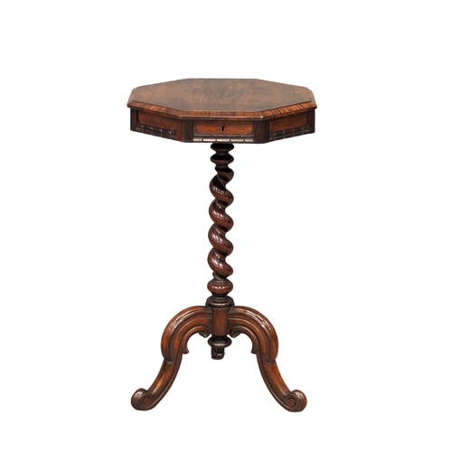 946 - A Victorian rosewood worktable with Barley Twist pedestal on Cabriole legs. 44x77cm