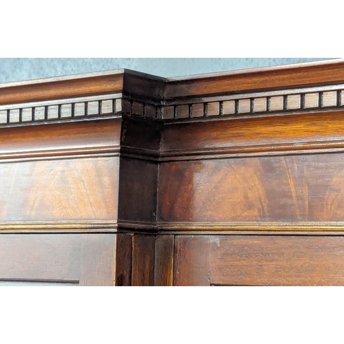 958 - A large Georgian style mahogany secretaire breakfront bookcase with astragal glazed doors and adjust... 