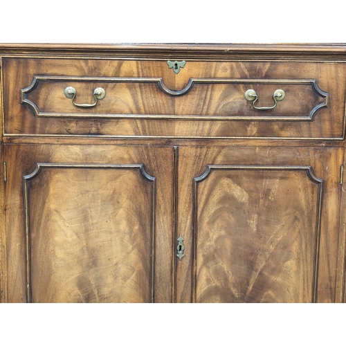 958 - A large Georgian style mahogany secretaire breakfront bookcase with astragal glazed doors and adjust... 