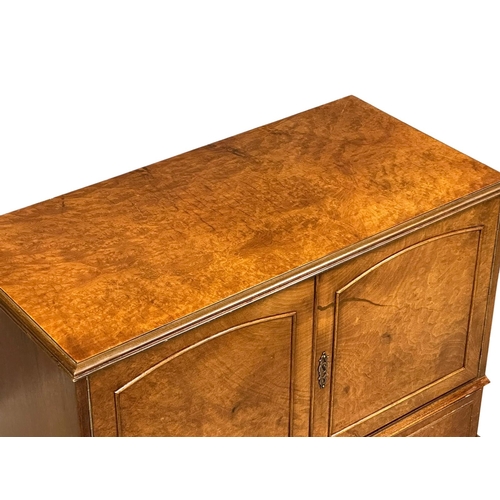 960 - A 1950’s Georgian style Burr Walnut cocktail cabinet with Queen Anne legs. 80x39x103cm