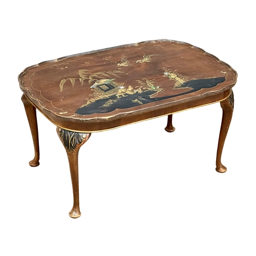 962 - A vintage coffee table and matching nest of tables with Chinoiserie decoration.