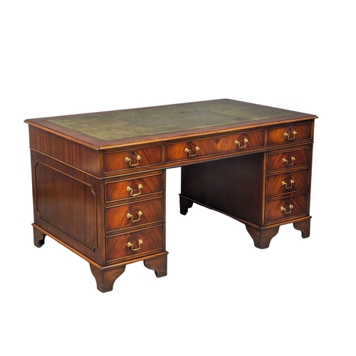 964 - A large Georgian style mahogany pedestal writing desk with leather top. 153x90x79cm