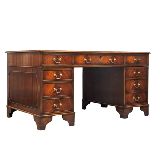 964 - A large Georgian style mahogany pedestal writing desk with leather top. 153x90x79cm