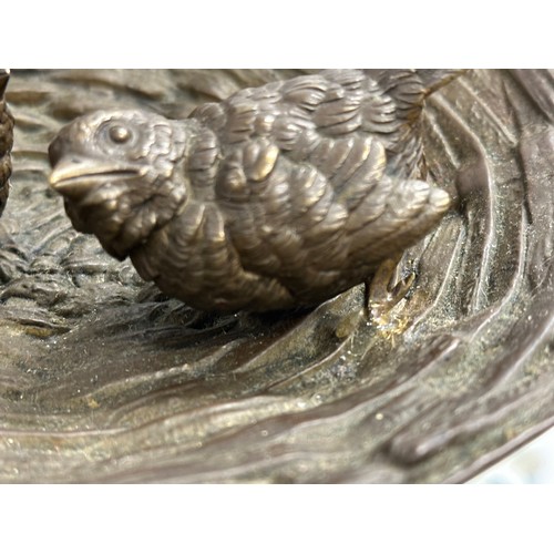 255 - A signed good quality bronze birds in the nest ornament. 20x21x13cm