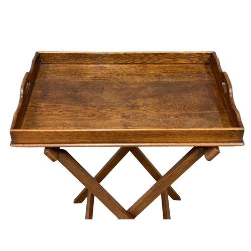 1205 - An Edwardian oak butlers tray on stands 70x51x86cm