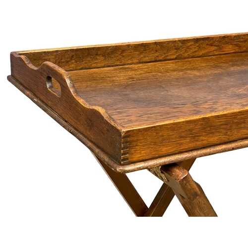 1205 - An Edwardian oak butlers tray on stands 70x51x86cm