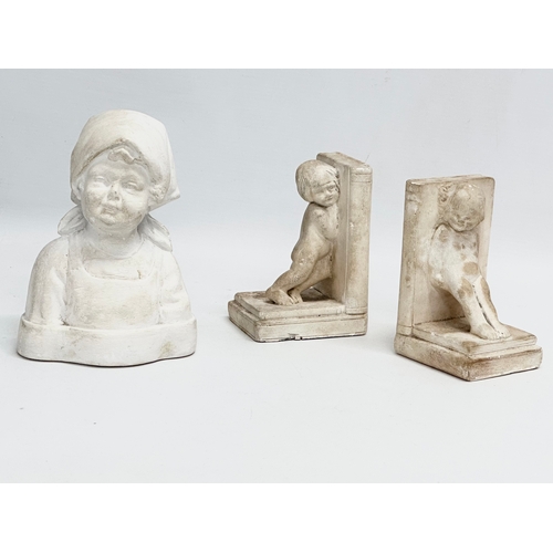 9 - A bust of a young girl attributed to Sophia Rosamund Praeger, and a pair of bookends in the manner o... 