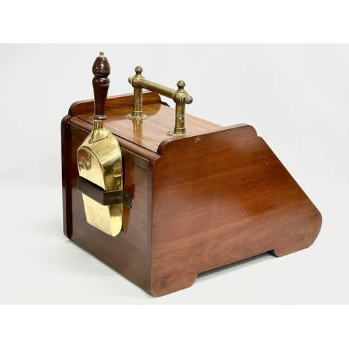 12 - A late Victorian inlaid mahogany coal scuttle in the Aesthetic Movement. 33.5x49x40cm