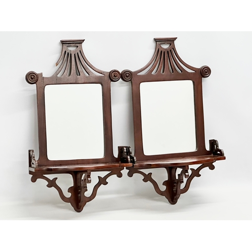 26 - A pair of 19th century style mahogany mirror back wall brackets. 29.5x14x51.5cm