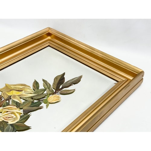 29 - A large early 20th century gilt framed painted bevelled mirror. Circa 1900-1920. 48.5x86.5cm