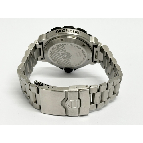 401 - A gents Tag Heuer Formula 1 watch with case. CAH1111 NQ7557.