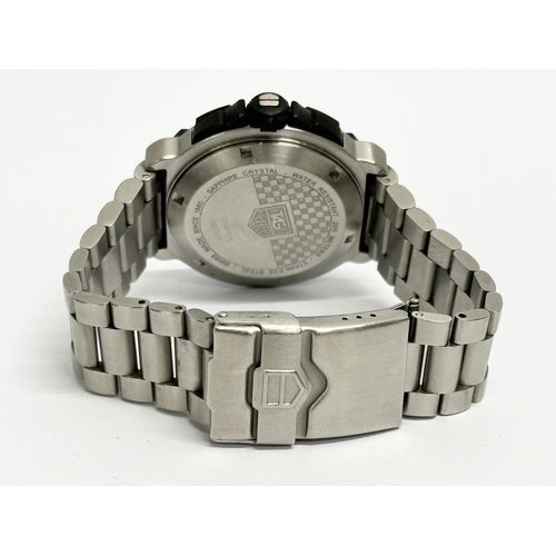 401 - A gents Tag Heuer Formula 1 watch with case. CAH1111 NQ7557.