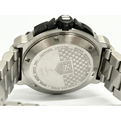 401 - A gents Tag Heuer Formula 1 watch with case. CAH1111 NQ7557.