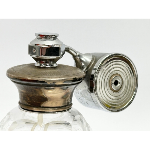 413 - A vintage silver plated and crystal perfume bottle 11.5cm