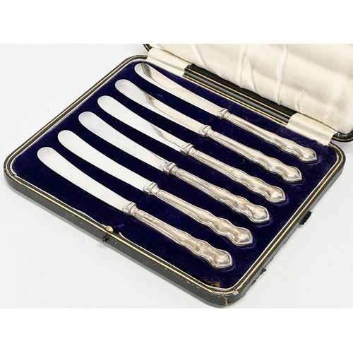 416 - A set of 6 early 20th century silver handled butter knives with case, by John Biggin. 1908.